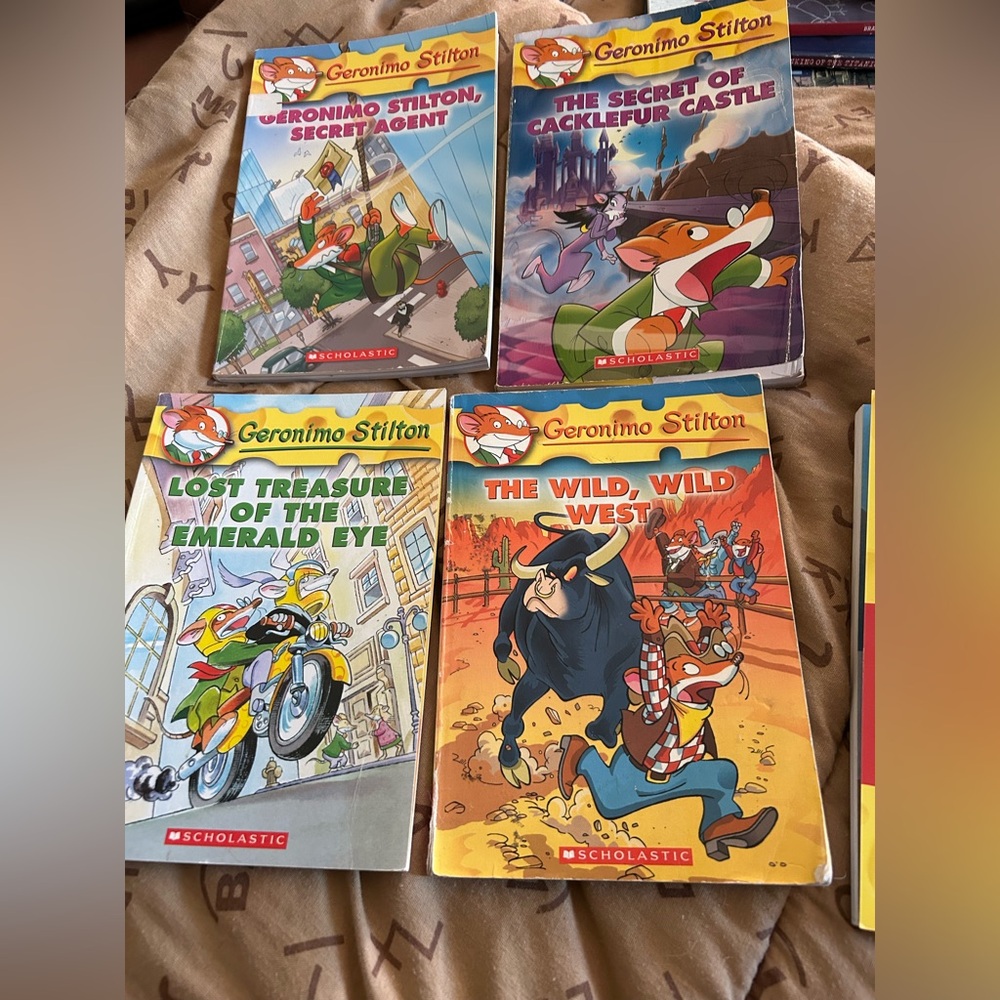 8 Geronimo Stilton Books including Merry Christmas Geronimo and The Wild West
